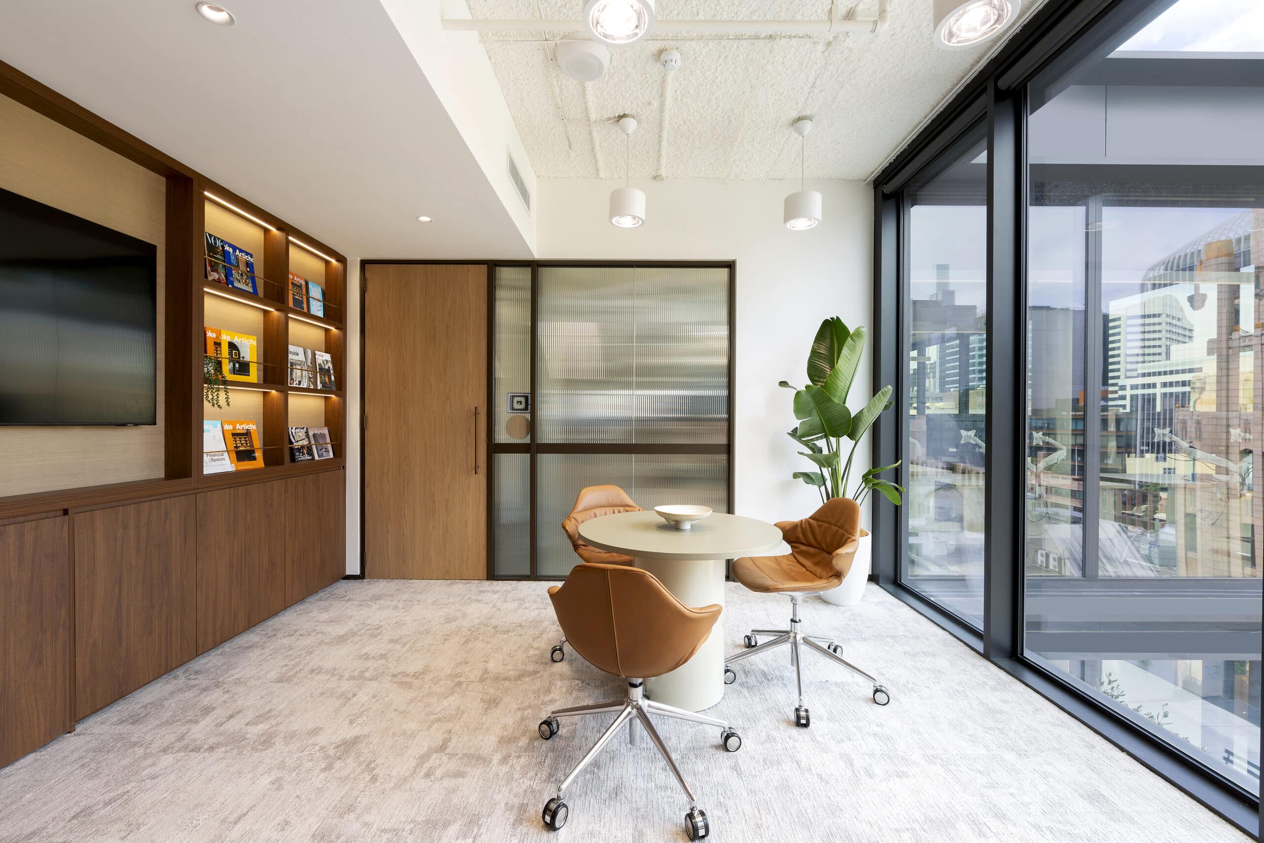 Relaxing room at the office with sofa's and calming energy. Designed as a space to recharge.